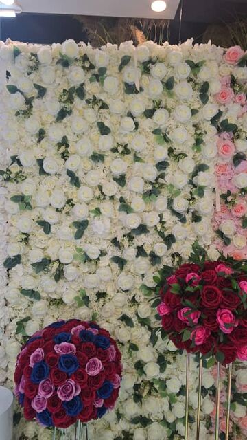 Floral wall backdrop with roses and hydrangeas