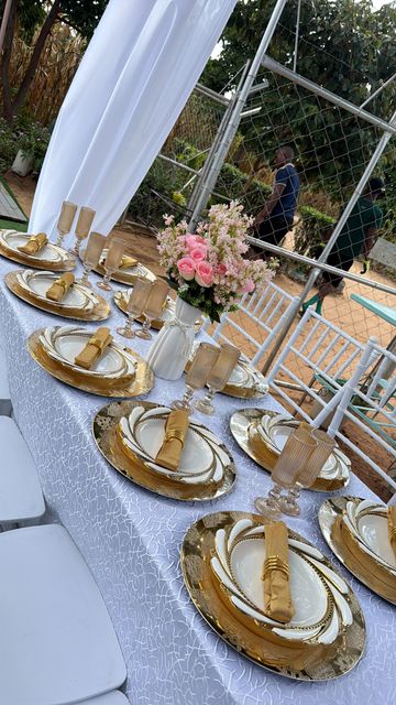 Gold charger place setting on silver sequin linen, by Triumphant Events